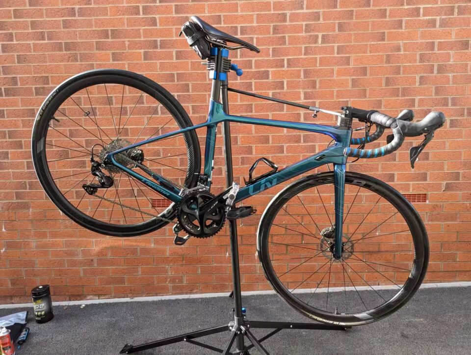 Clean side profile of a second hand bike in natural lighting