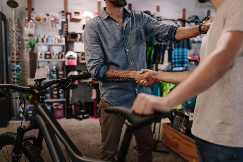 shaking hand when buying a second hand bike