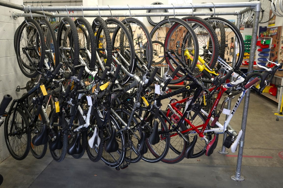 an example of hanging bikes from a second hand bike shop when you buy a used bike