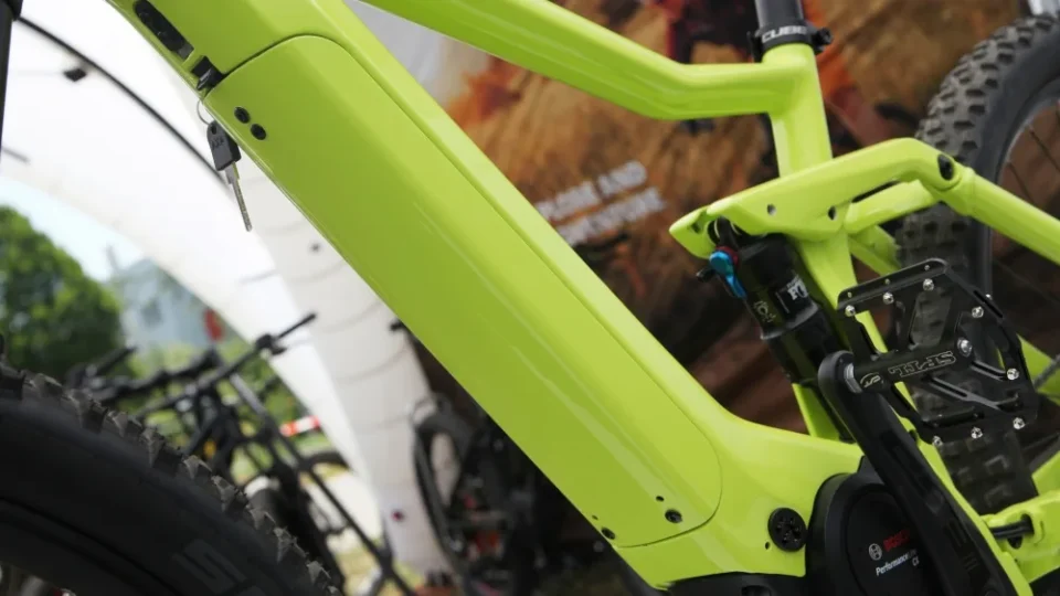 Pre-owned electric bike frame with battery compartment