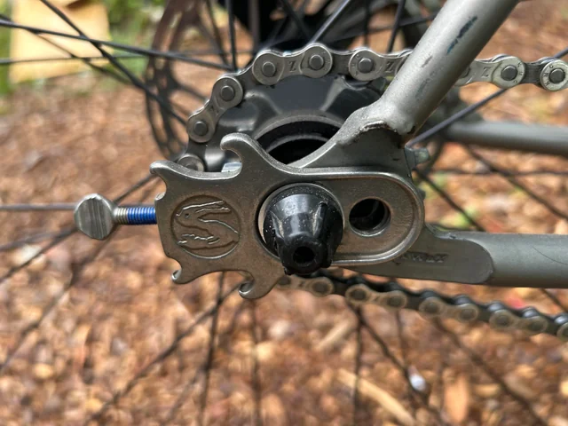 Assorted second-hand bike parts including bolts and fittings