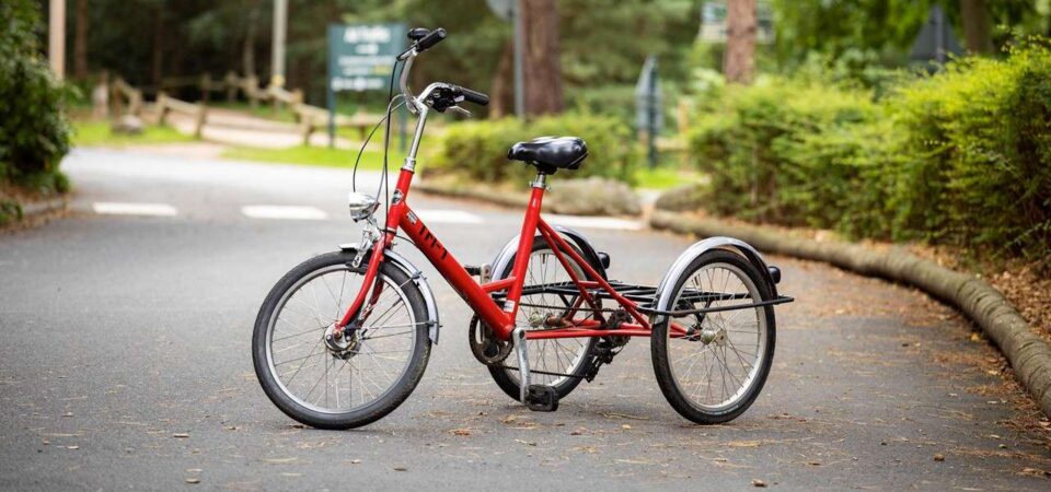 Second-hand adult disability tricycle with rear cargo basket and step-through frame