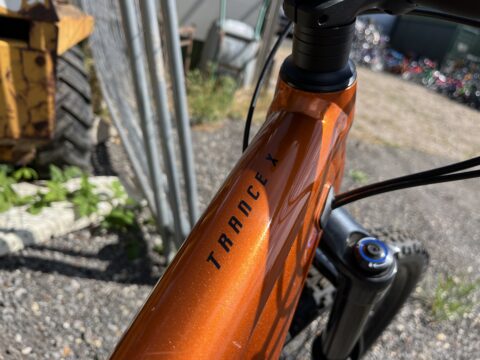 The Trance X metallic orange frame finish in direct sunlight. Buy and sell on shifta.