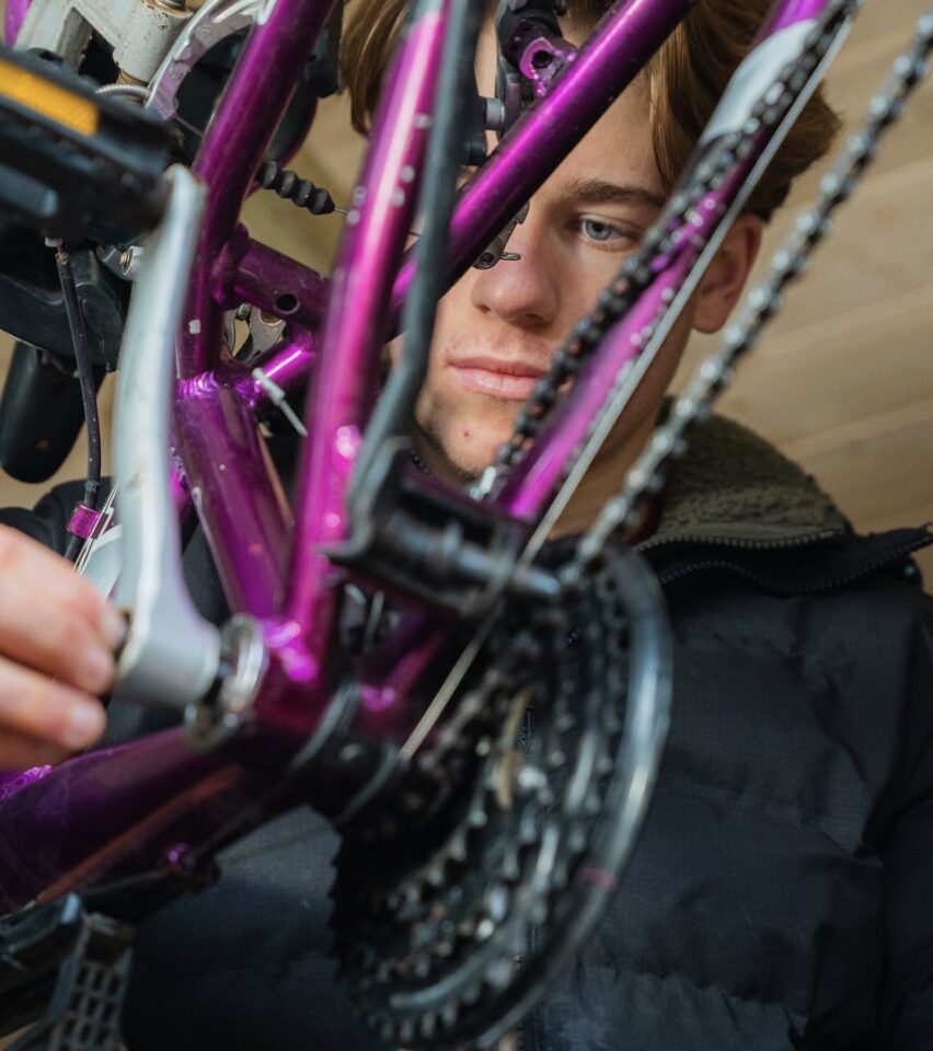 Bicycle mechanic servicing bike at HEP Bikes Watford – refurbished and repaired bikes in Hertfordshire