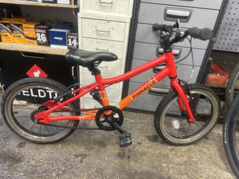 Pinnacle koto 16 kids bike 16” wheels aluminium frame good condition red/orange v brakes for sale in Biggin hill by Pop In cycles on SHIFTA marketplace. Top quality second-hand bikes online.