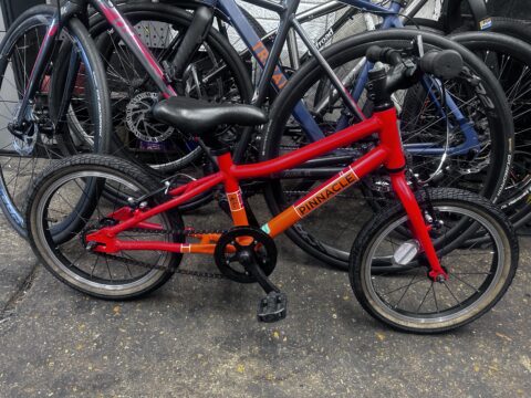 Pinnacle koto 16 kids bike 16” wheels aluminium frame good condition red/orange v brakes for sale in Biggin hill by Pop In cycles on SHIFTA marketplace. Top quality second-hand bikes online.